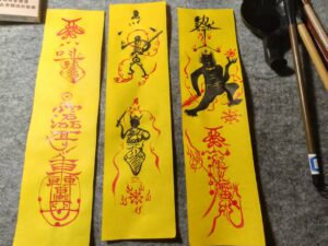 Three exquisitely crafted Taoist talismans